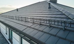 Closeup,Snow,Guard,For,Safety,In,Winter,On,House,Roof